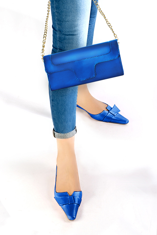 Women's electric blue luxurious elegant clutch for ceremonies, weddings and evenings out. - Worn view